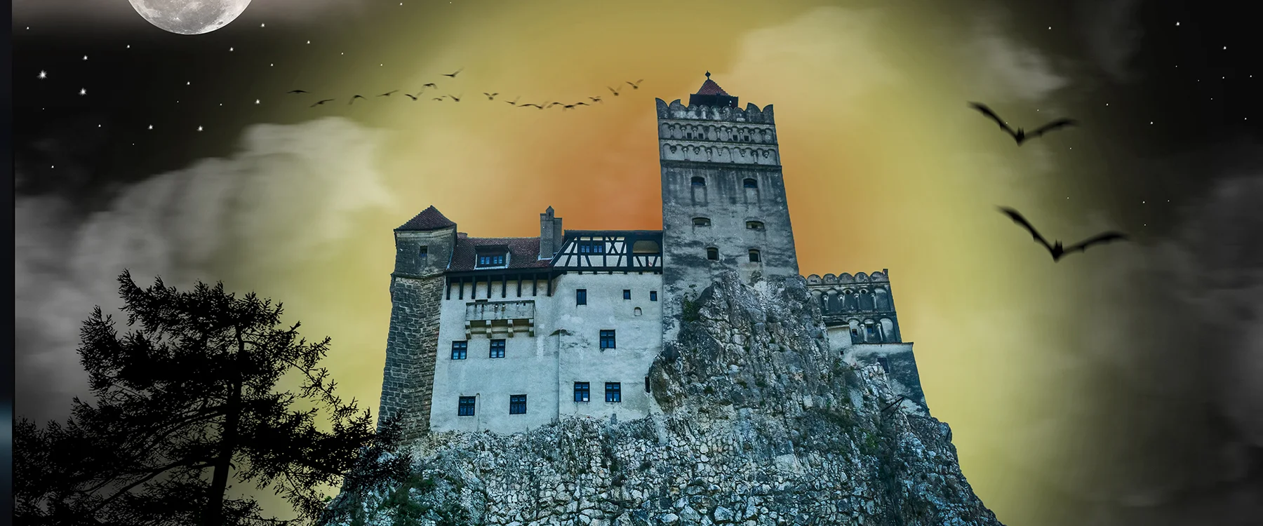 Halloween illustration of Bran Castle with a moon and bats against a dark background.